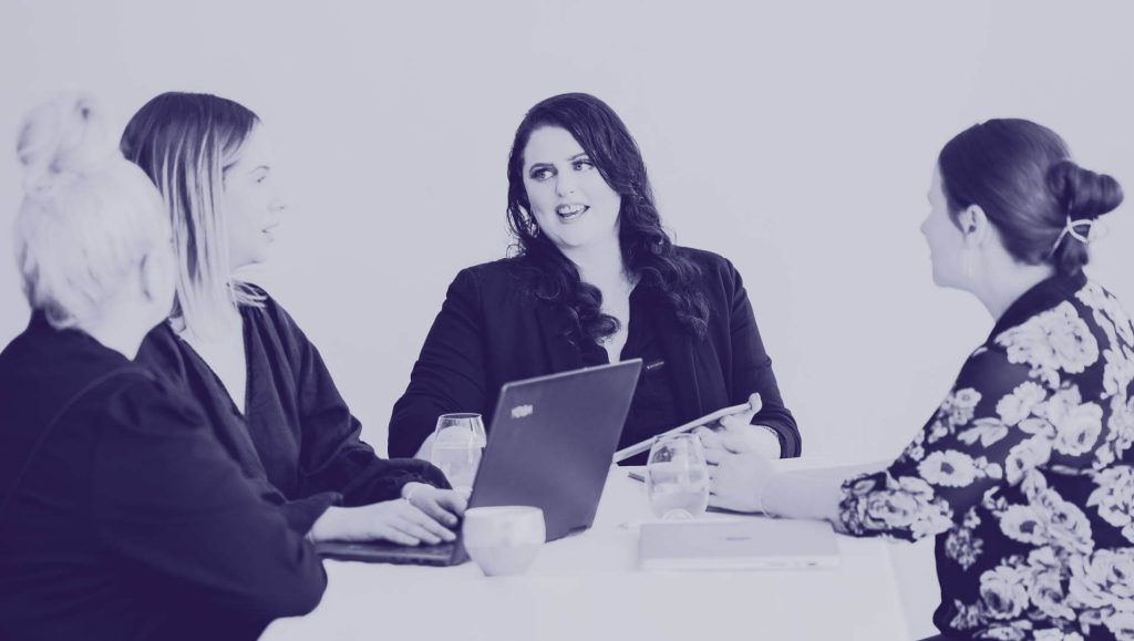 Jackie Talking to Clients